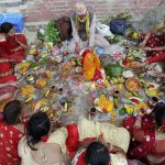 Nepalease Hindu devotees pray as they stand on the banks of the Bagmati river during the Rishi Panchami festival in Kathmandu on September 6.