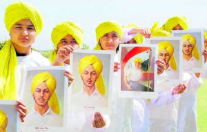 Schoolgirls dressed up as Shahid Bhagat Singh on Martyrdom Day