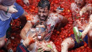 The annual ‘Tomatina’ battle, which has become major tourist attraction, about 160 tons of tomatoes are dumped by the trucks for around 20,000 participants in the town of Buñol.