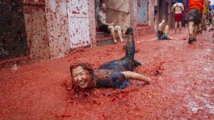 The fight normally lasts for an hour, after which the town square is covered with tomato debris.