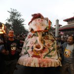 Traditional Nepalese masked dancers, locally know as Pulankisi mask (White Elephant), perform on the first day of the Indra Jatra festival at Hanuman Dhoka in Kathmandu on September 13.