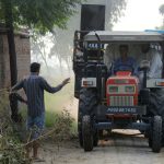 Villagers from the India-Pakistan border area ride on a tractor as they evacuate from a border village near Mahawa, about 40 kms from Amritsar on September 29.