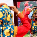 A participant getting ready for her performance during “Ratnawali” a state level Haryana Day celebration at Kurukshetra University, Kurukshetra.