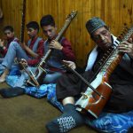 Afghan music students play the Dilroba — an Afghan string instrument — during a class at the Afghanistan National Institute of Music in Kabul.