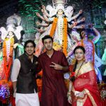 Bollywood film director Ayan Mukerji, (L), actors Ranbir Kapoor (C) and Sarbani Mukerji attend the celebration of the North Bombay Sarbojanin Durga Puja, in Mumbai on October 9, 2016.