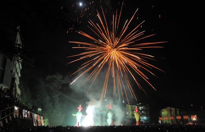 Fireworks light the sky the sky on the occasion of the Hindu festival of Dussehra.at Shimla’s Summerhill on October 11, 2016.