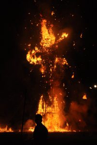 Hindu devotees burn an effigy of demon king Ravana as they celebrate the Hindu festival of Dussehra in Gurgaon on October 11, 2016.