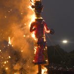 Hindu devotees burn an effigy of demon king Ravana as they celebrate the Hindu festival of Dussehra in Panchkula on October 11, 2016.