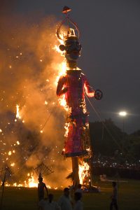 Hindu devotees burn an effigy of demon king Ravana as they celebrate the Hindu festival of Dussehra in Panchkula on October 11, 2016.