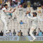 India's Umesh Yadav (L) celebrates the wicket of Englands Adil Rashid along with Virat Kohli (C) during the fifth day of the fifth and final Test cricket match between India and England at the MA Chidambaram Stadium in Chennai on December 20, 2016.