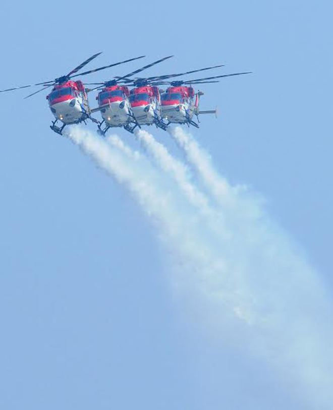 Indian Air Force's ALH team performs at the 84th Air Force Day parade at the Hindon air base on the outskirts of New Delhi on October 8, 2016.