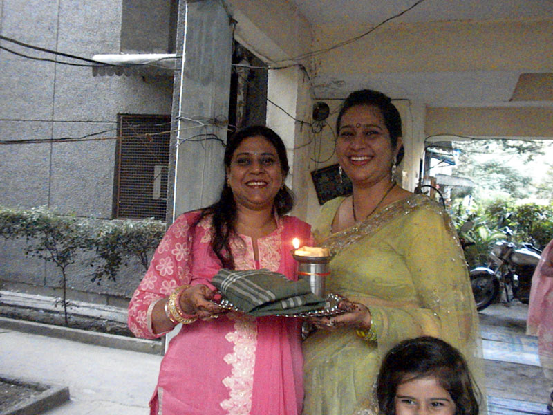 Manpreet Malik & Janvi Kalia at Karwa Chauth Puja being held at Cosy Apartments, Sector 9, Rohini, New Delhi