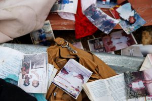 Pictures are seen on the floor of a destroyed house after Hurricane Matthew passes Jeremie, Haiti, on October 7, 2016.