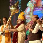 Prime Minister Narendra Modi being presented a mace as he is welcomed during Dussehra celebrations at Aishbagh Ram Leela in Lucknow, Uttar Pradesh on October 11, 2016. Governor of Uttar Pradesh, Ram Naik and the Union Home Minister Rajnath Singh are also seen.