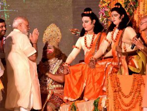 Prime Minister Narendra Modi with artistes plying Lord Rama and Lakshman during Dussehra celebrations at Aishbagh Ram Leela in Lucknow, Uttar Pradesh, on October 11, 2016.