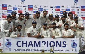 Team India pose for a group photograph with the winning trophy after registering test series win against England, at The MA Chidambaram Stadium in Chennai on December 20, 2016.