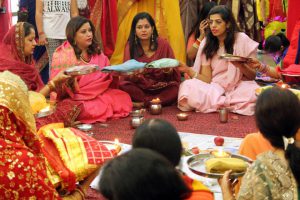 Women gather for a prayer event during the Karva Chauth festival at a temple in Amritsar on October 19, 2016.