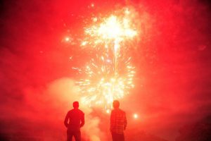 Athletes watch fireworks at the Madan Mohan Malviya stadium on the eve of the Hindu festival of Diwali in Allahabad.