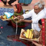 Bihar Chief Minister Nitish Kumar performs rituals at his residence on the occasion of the Chhath Puja festival in Patna