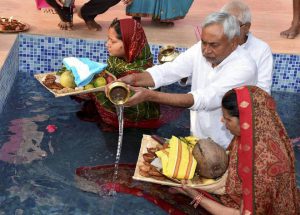 Bihar Chief Minister Nitish Kumar performs rituals at his residence on the occasion of the Chhath Puja festival in Patna