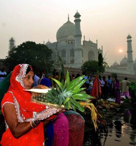 Devotees offering prayers on the occasion of Chhath Puja festival in Agra
