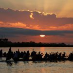 Participants power their boat on the Tonle Sap river during the annual Water Festival on the Tonle Sap river in Phnom Penh, Cambodia, on November 14, 2016.