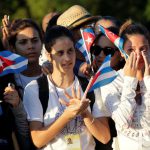 People watch a military vehicle transport the ashes of Cuba’s late President Fidel Castro at the start of a three-day journey to the eastern city of Santiago, in Havana, Cuba, on November 30, 2016. Castro’s ashes will go on a four-day island-wide procession starting Wednesday before being buried in the southeastern city of Santiago de Cuba on December 4.