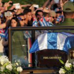 People watch a military vehicle transport the ashes of Cuba’s late President Fidel Castro at the start of a three-day journey to the eastern city of Santiago, in Havana, Cuba, on November 30, 2016. Castro’s ashes will go on a four-day island-wide procession starting Wednesday before being buried in the southeastern city of Santiago de Cuba on December 4.