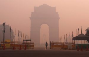 Security personnel stand guard in front of the India Gate amidst the heavy smog in New Delhi, on October 31.