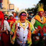 Clowns participate in a show during Salvadoran Clown Day celebrations in San Salvador, El Salvador, December 7