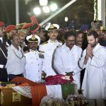 Congress Vice President Rahul Gandhi pays his respects to former Tamil Nadu chief minister J Jayalalithaa at the MGR Memorial in Chennai on December 6, 2016.