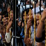 Fans of Bollywood actor Om Puri stand outside his house in Mumbai, India, on January 6, 2017