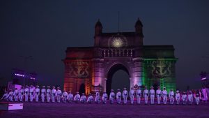 Navy personnel perform during Navy Day celebration at Gateway of India