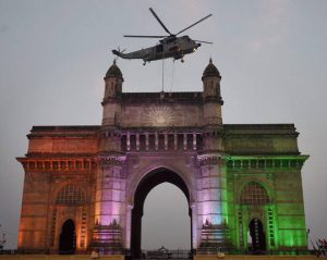 Navy personnel perform during the Navy Day celebrations at Gateway of India in Mumbai