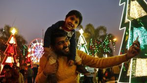 People enjoying on Christmas Eve at Select City Walk mall, Saket in New Delhi