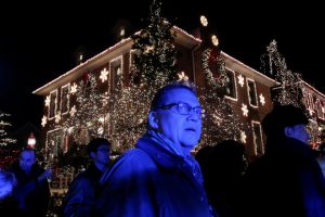 People walk through the Dyker Heights Christmas Lights in the Dyker Heights neighborhood of Brooklyn, New York City, US, on December 23, 2016.