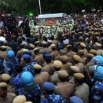4The mortal remains of former Tamil Nadu chief minister J. Jayalalithaa are carried during a procession to her burial place in Chennai on December 6, 2016.