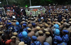 4The mortal remains of former Tamil Nadu chief minister J. Jayalalithaa are carried during a procession to her burial place in Chennai on December 6, 2016.
