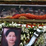 The mortal remains of former Tamil Nadu chief minister J. Jayalalithaa are carried during a procession to her burial place in Chennai on December 6, 2016.
