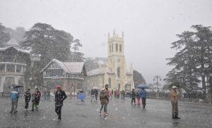 Tourists enjoy first snowfall of the season on Christmas in Shimla