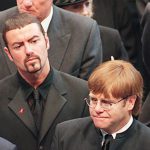 This file photo taken on September 6, 1997 shows pop stars George Michael (L) and Elton John (R) leaving Westminster Abbey following the funeral service of Diana, Princess of Wales.