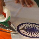 A man gets the Tricolour, which was designed by Pingali Venkayya, ready for Republic Day