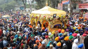 A vehicle carrying Guru Granth Sahib during the Nagar Kirtan procession at Gandhi Maidan in Patna