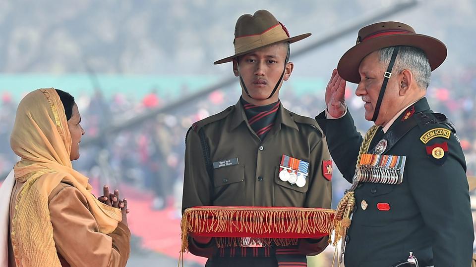 Army Chief Gen Bipin Rawat salutes the widow of an army martyr after honouring her at the Army Day parade. He also awarded the Sena Medal to a number of Army personnel.