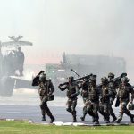 Army soldiers display their war skills at the 69th Army Day parade in New Delhi