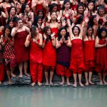 Devotees offer prayers before taking a holy bath in the Bagmati river at Pashupatinath Temple during the Swasthani Brata Katha festival in Kathmandu, Nepal