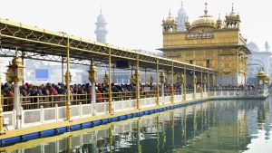 Devotees pile up in huge number to offer prayers on the occasion of the 350th birth anniversary of the tenth Sikh Guru Gobind Singh at Golden Temple in Amritsar