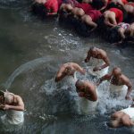Nepalese Hindu devotees gather to bathe in the Shali river on the outskirts of Kathmandu on January 12. Hundreds of married and unmarried women in the Himalayan nation have started a month-long fast in the hope of a prosperous life and conjugal happiness