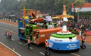 Performers surround a tableaux representing Skill India during 68th Republic Day parade in New Delhi
