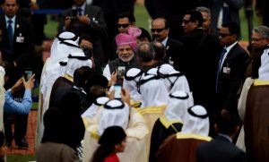 Prime Minister Narendra Modi poses with a UAE delegates as he takes selfie from his mobile during the 68th Republic Day celebrations at Rajpath in New Delhi